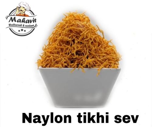 Yellow Mahavir Nylon Spicy Sev Namkeen, For Home, Packaging Type : Plastic Packet