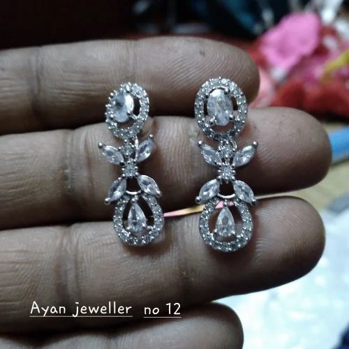 Silver Polish American Diamond Earrings, Occasion : Party Wear