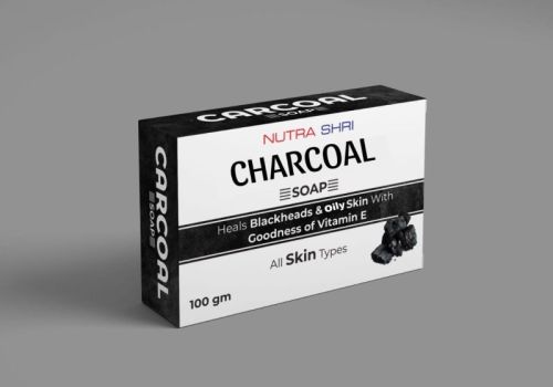 Black NUTRASHRI Solid Rectangular 100gm Vitamin E Charcoal Soap, Packaging Type : Paper Box