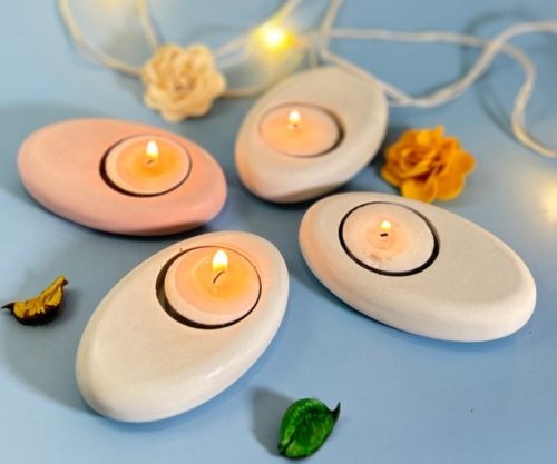 Pebble Shaped Tea Light Candles, For Party, Decoration, Speciality : Attractive Pattern, Smooth Texture