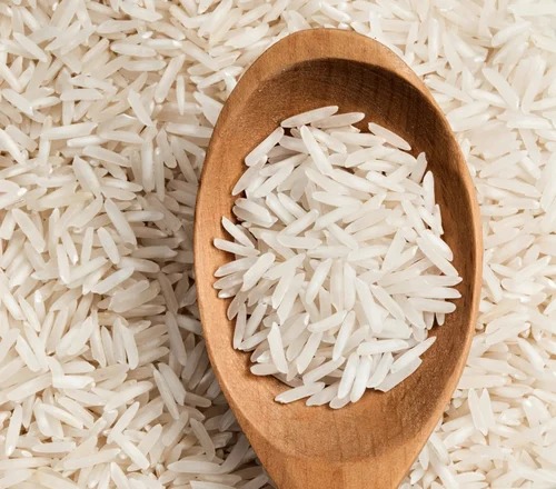 Fully Polished Hard Common Parmal Raw Basmati Rice, For Human Consumption, Packaging Type : Jute Bags