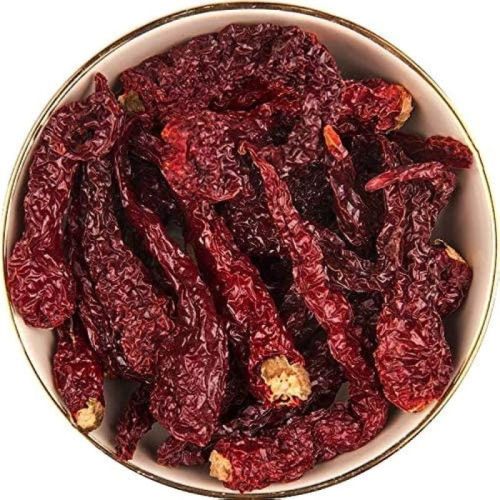 Red Raw Natural Kashmiri Chilli, For Cooking, Spices, Packaging Type : PP Bags