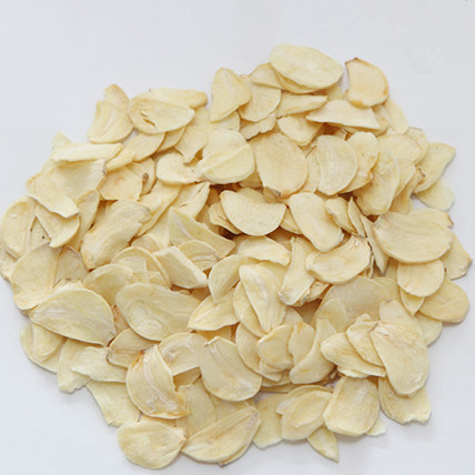 Creamy Dried Garlic Flakes, For Cooking, Grade : Food Grade