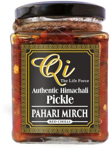 Red Qi Pahari Mirch Pickle, For Eating, Home, Hotel, Restaurants, Packaging Type : Glass Container