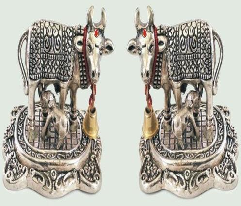 Carved Polished Metal Silver Cow Statue, For Decoration, Size : Standard