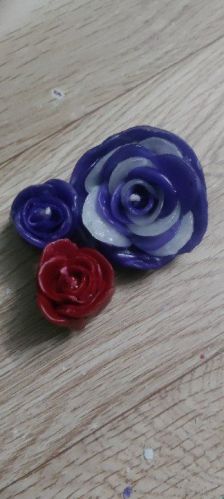 Glossy Paraffin Wax Flower Shaped Handmade Candle, For Party, Lighting, Decoration, Speciality : Smokeless