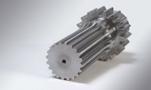 Grey Carbon Steel Sprocket Shaft, For Industrial Use, Feature : High Strength, Rust Proof