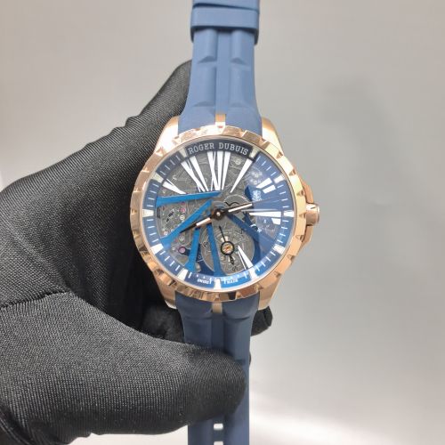 Roger Dubuis Oblvlo Cyber Skeleton Edition Gold Black Dial Blue Rubber Strap Swiss Automatic Watch
