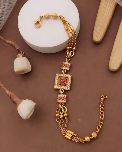 Gold-Plated Designer Bracelet with Pink Stones & Multilayer Chain