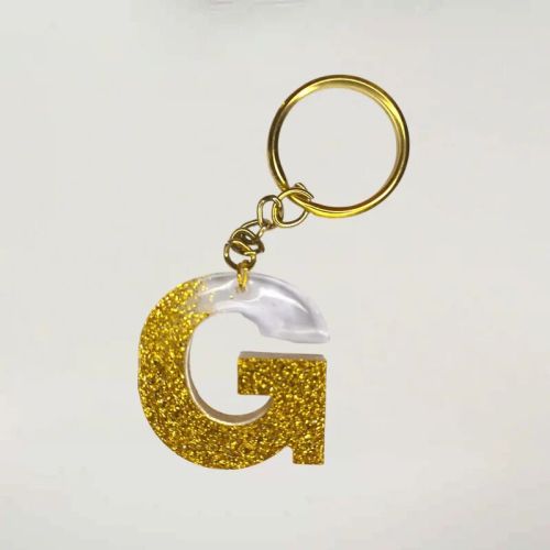 Trendy Golden Sparkle Resin Keychains With Multi Alphabet