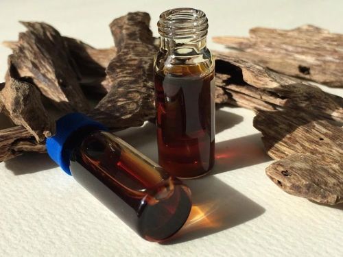 Assam Agarwood Oil, Color : Red-brown, Dark-brown, Brown