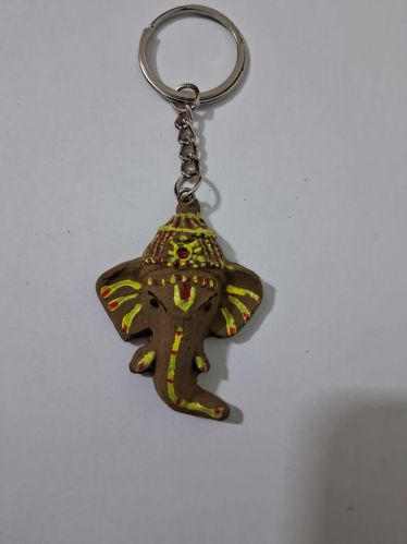 Handmade Ganesha Cow Dung Key Chain, Color : Brown, Weight : 20-30gm