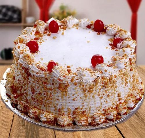 Cherry Flavored Butterscotch Cake, Shape : Round, Weight : Half Kg