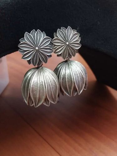 Floral Oxidized Lotus Women Jhumka Earrings, Color : Silver