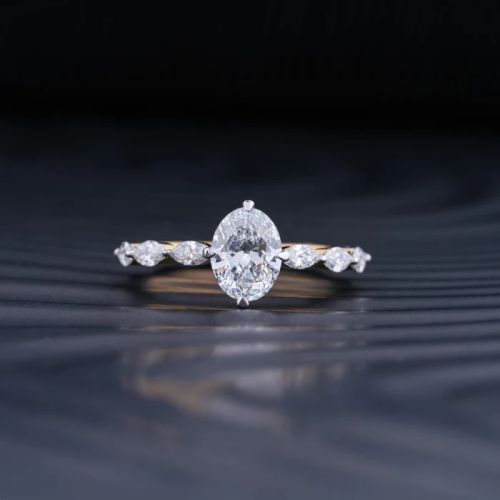 Oval Diamond Ladies Ring With Marquise Side Stones