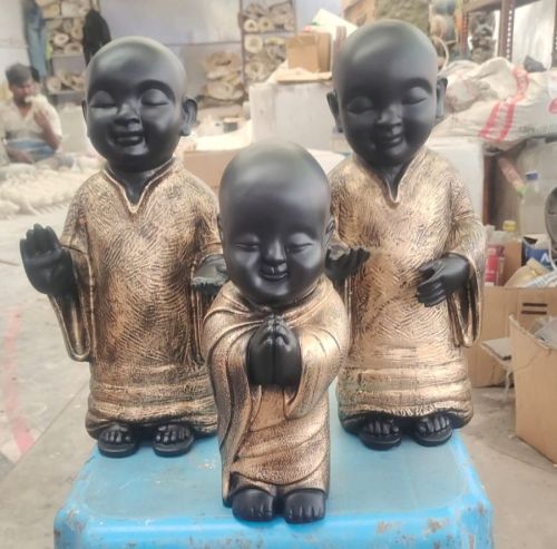 Color Coated Polyresin Baby Monks Buddha Set, Packaging Type : Golden