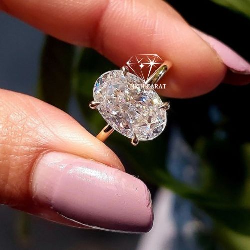 Oval Cut White Colorless Solitaire Diamond Engagement Ring