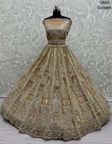 Women Motif And Zircon Diamond Work Studded Golden Color Net Lehenga Choli