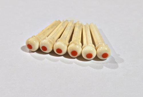 S.f International Polished Bone With Red Jasper Bridge Pins