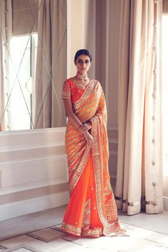 Fascinating Orange Saree In Pure Georgette for Casual, Partywear