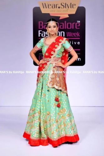 Mint Green And Radiant Red Exquisite Lehenga