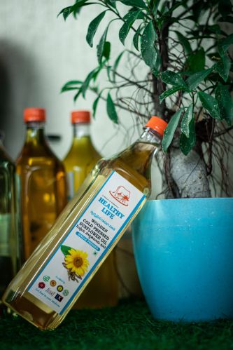 Wooden Cold Pressed Sunflower Oil, Packaging Type : Bottle for Cooking