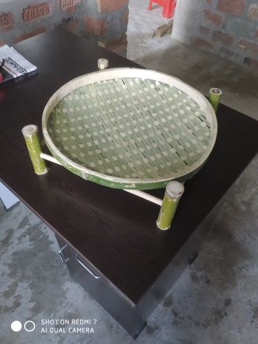 Woven Bamboo Vegetable Basket, Shape : Circular With Raised Edges