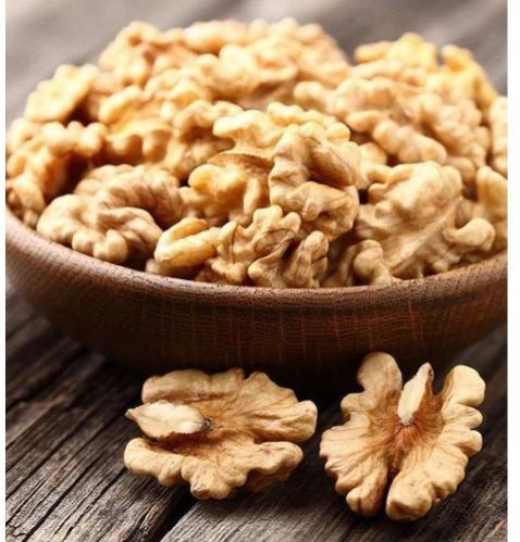 Natural Dry Split Walnuts, Color : Brown, Taste : Light Sweet