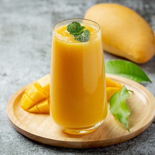 Frozen Alphonso Mango Puree, Color : Yellow