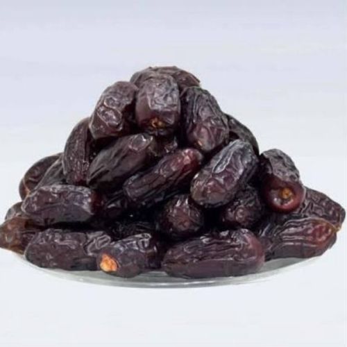 Kalmi Safawi Black Dates, Color : Dark Brown