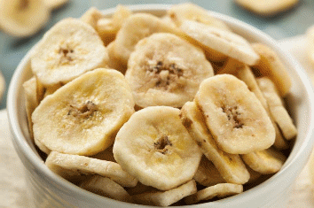 Dehydrated Banana Chips, For Snacks, Packaging Type : Plastic Packet