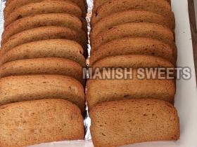 Crispy Wheat Toast, Color : Brown, Packaging Type : Plastic Packets