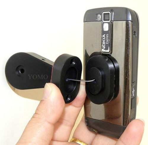 Retractors and Tethers For Retail Store Displays