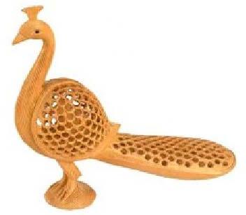Wooden peacock statue