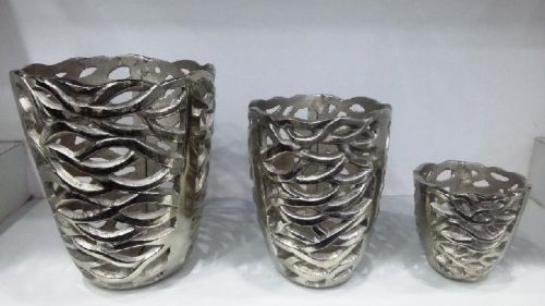 Polished Metal T-Light Candle Holder, For Home Decoration, Party, Size : Mutlisize