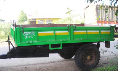 Two Wheeled Red Tipping Trailer