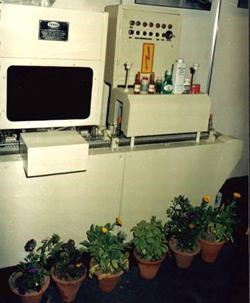 Automatic Neck Band Sleeve Applicator.