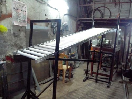 Polished Metal Roller Conveyor System, For Moving Goods, Feature : Excellent Quality, Heat Resistant