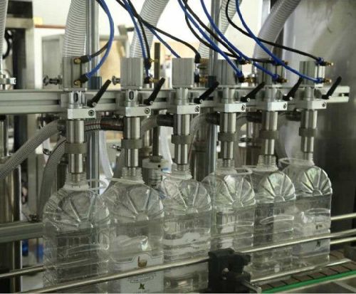 FOUR HEAD Bottle Filling Machine, Power : 2HP