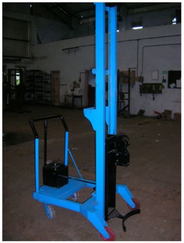 DRUM STACKER WITH AUTO GRIPPER