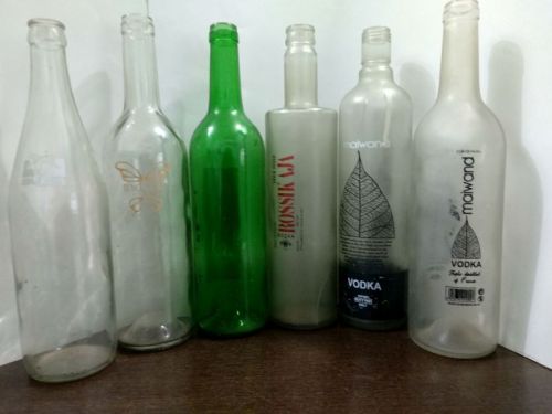 Liquor Glass Bottles, For Essential Oil, Juice, Perfume, Water Storage, Feature : Fine Finished, Perfect Shape