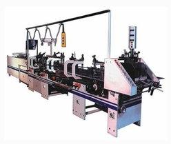 HIGH SPEED CARTON FOLDING AND GLUING MACHINE