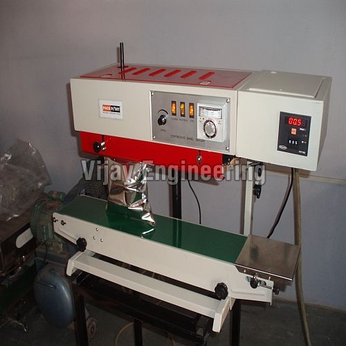 Vertical Continuous Bag Sealing Machine, For Industrial Use, Specialities : Robust, Efficient Performance