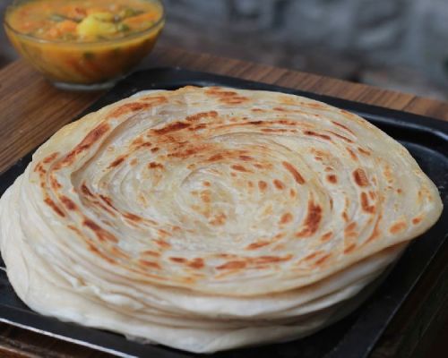 Frozen Malabar Paratha, Packaging Type : Plastic Packets