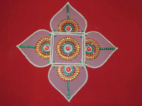 Paper Multicolor Decorative Rangoli, Feature : Easy To Use, Fine Craftsmanship, Good Quality, Highly Durable