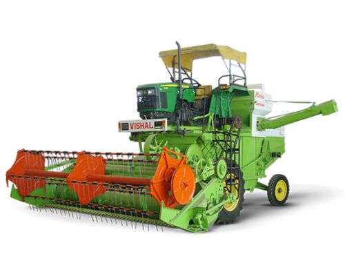 Tractor driven combine harvester