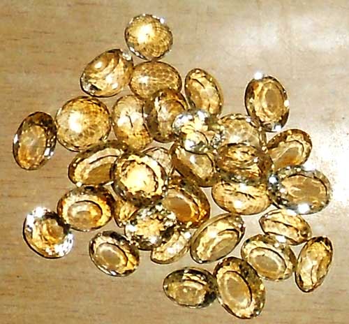 Oval Polished Golden Topaz Stones, For Jewellery, Size : 0-10mm, 10-20mm, 20-30mm