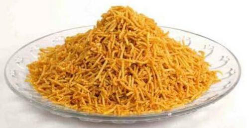 Orange Allo Bhujia Namkeen, For Snacks, Taste : Spicy Salty