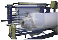 JUMBO ROLL TO SMALL ROLL REWINDING MACHINE