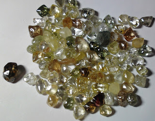 Rough Diamonds ,Gold Bars,ruby Saphires and Other Gems